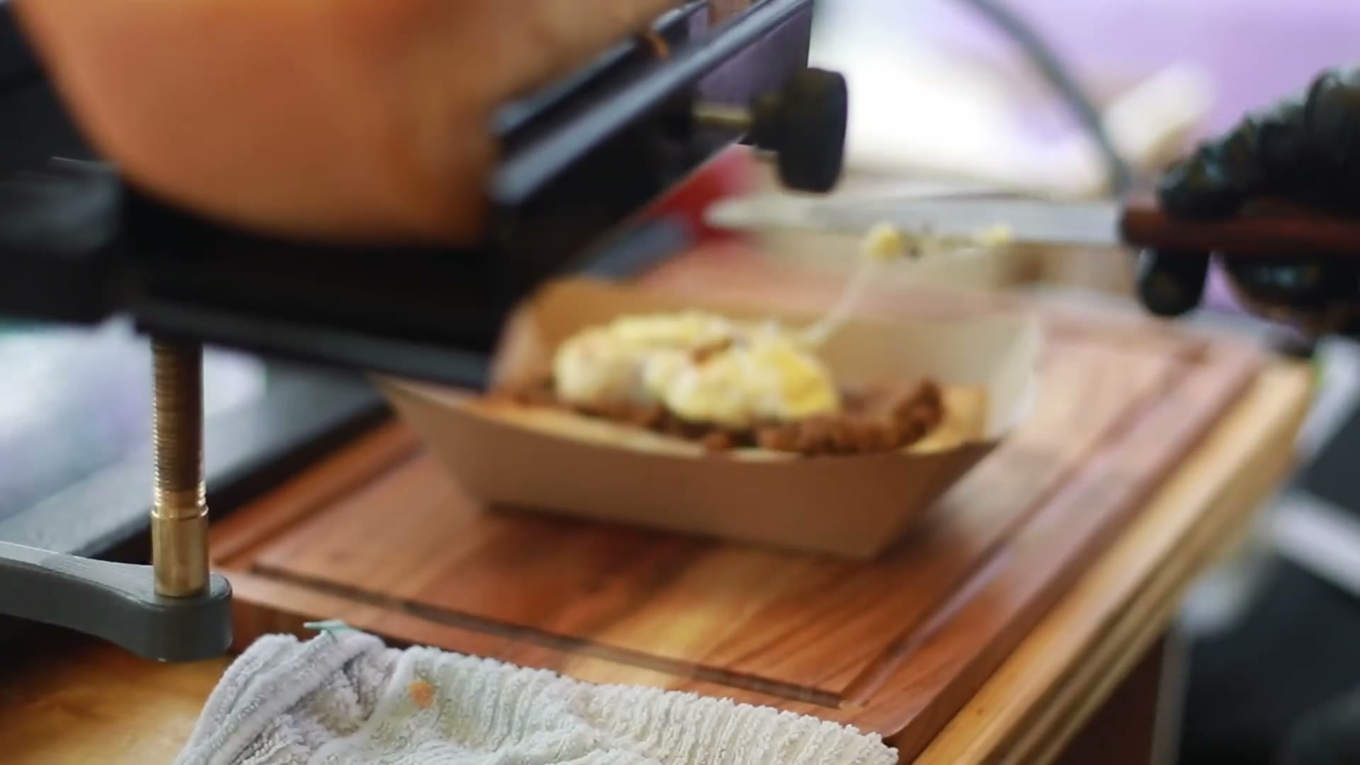 The Melted State — raclette cheese scraped over a loaded melt